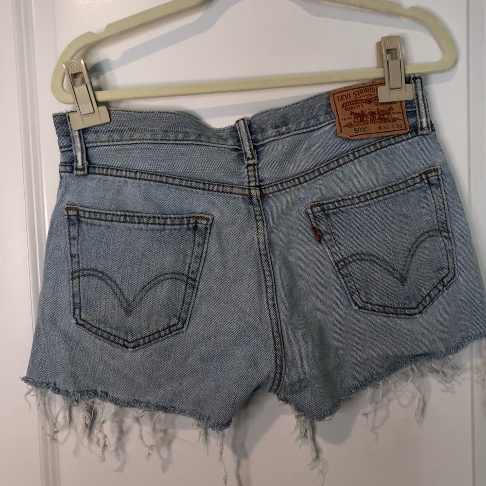 Urban outfitters Levi distressed jean shorts. New with tags size medium.